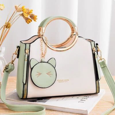 👜 MUSEUM | Playful and Modern: Qinghe·Lingmao Series Round Metal Handle Color Block Bag