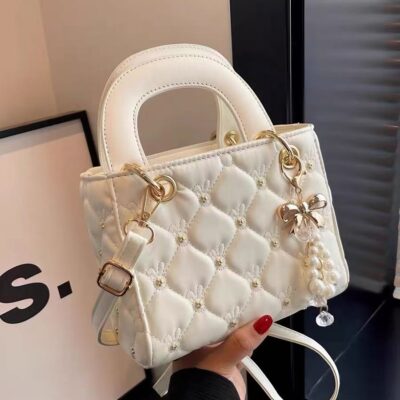 👜 MUSEUM | Pure Aesthetics: Daylight & Corona Collection Quilted Pearl Buckle Handbag